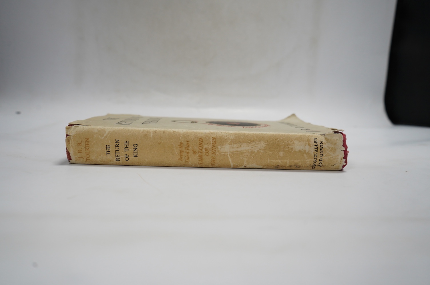 Tolkien, J.R.R - The Return of the King, 1st edition, 1st impression, London: George Allen & Unwin, 1955, folding map at rear, original red cloth gilt, unclipped dust jacket, 8vo, George Allen & Unwin, London, 1955.